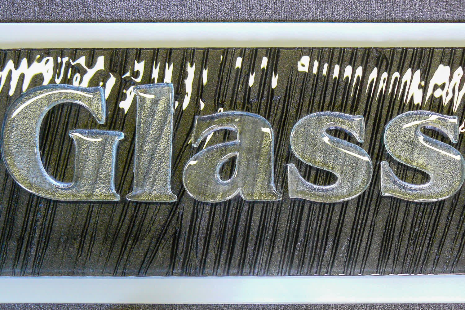 cut from glass kiln formed letters G, l, a, s, s