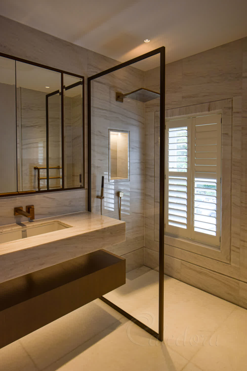 Fixed bronze shower screen with anodised frame and ultra clear glass