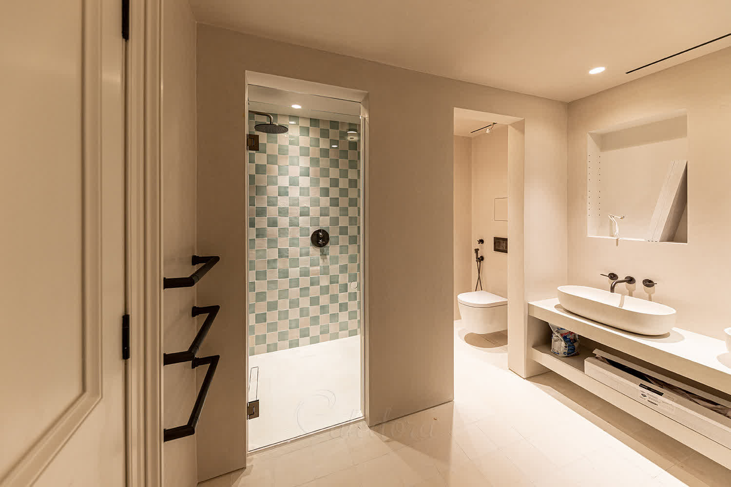 Hinged frameless shower door showing 150mm ventilation gap above for steam release