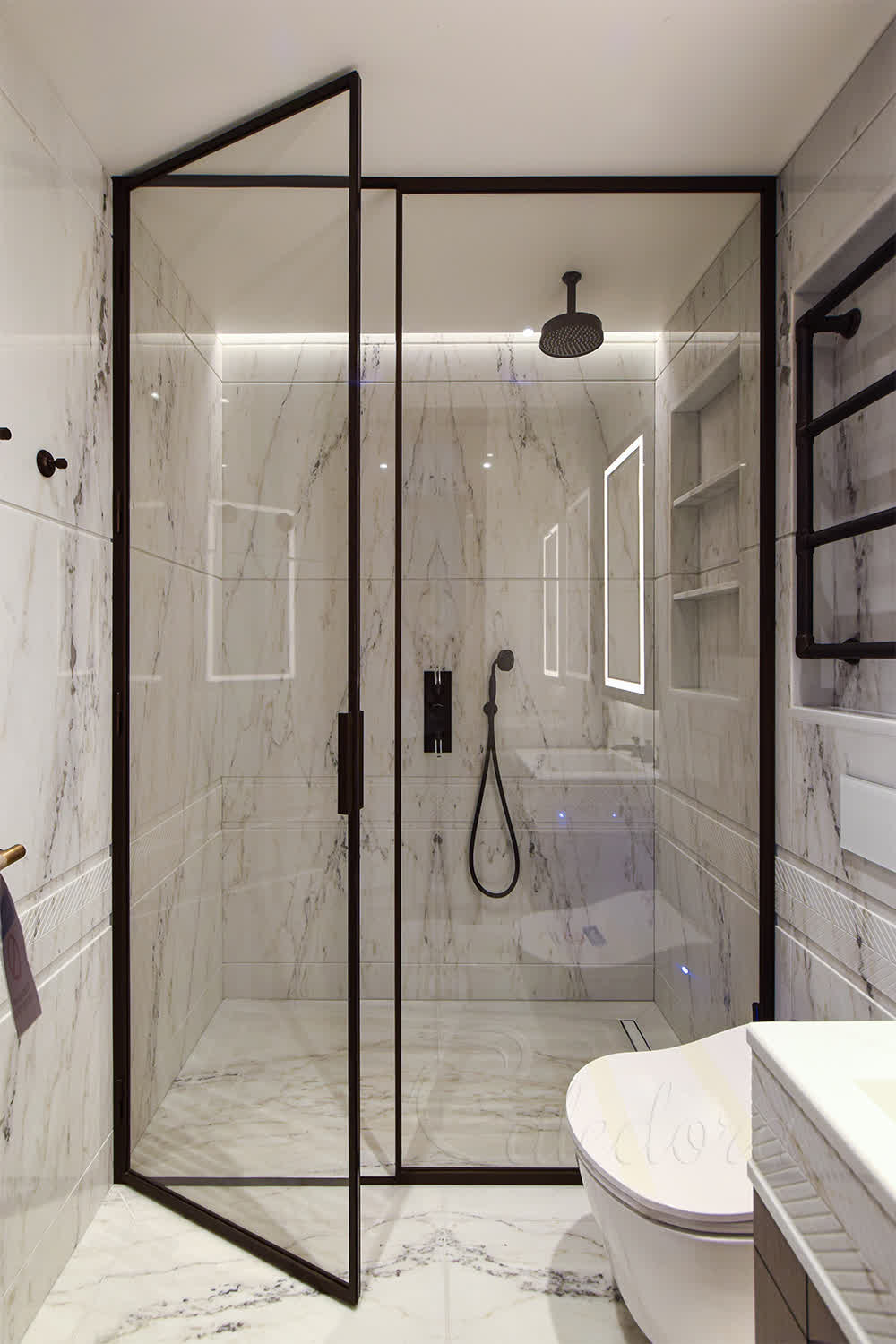 Large bronze framed shower enclosure with ultra clear glass and swing door
