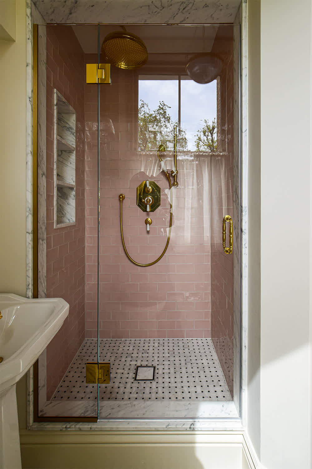 glass-to-glass shower door with brass hinges