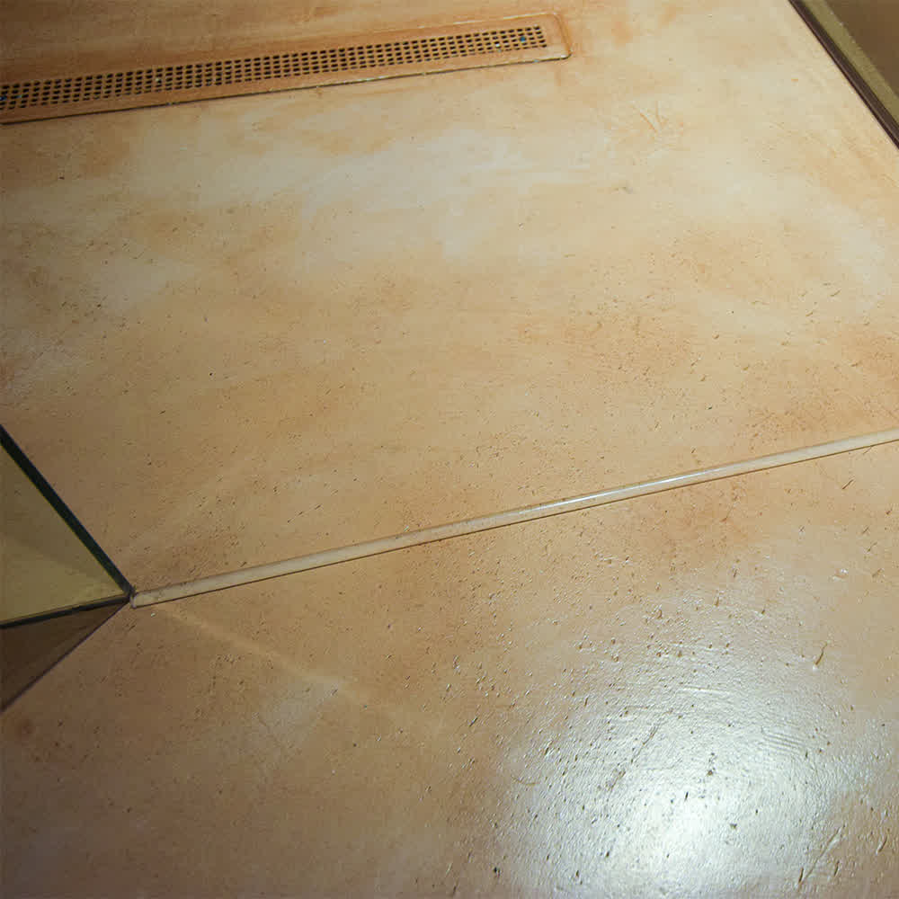 shower door threshold glued to the floor