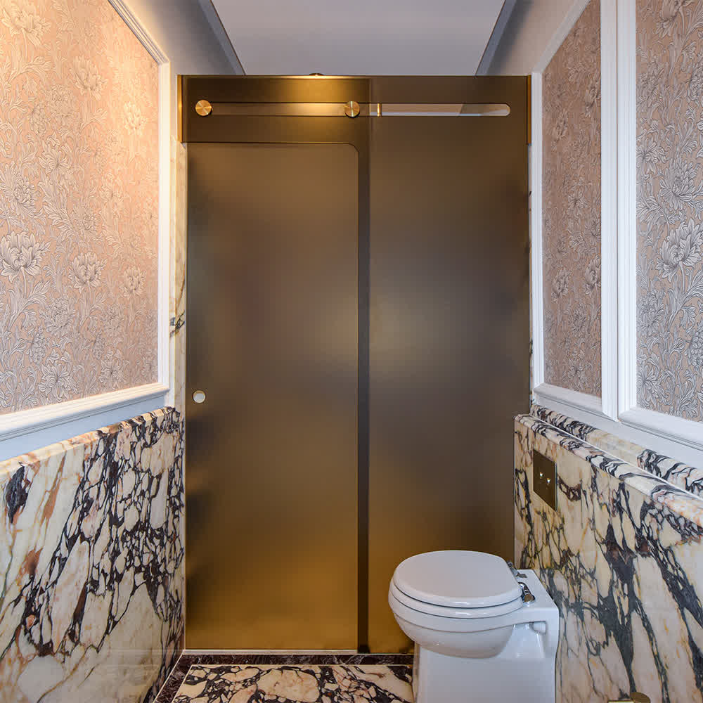 bronze glass enclosure with glass overlap